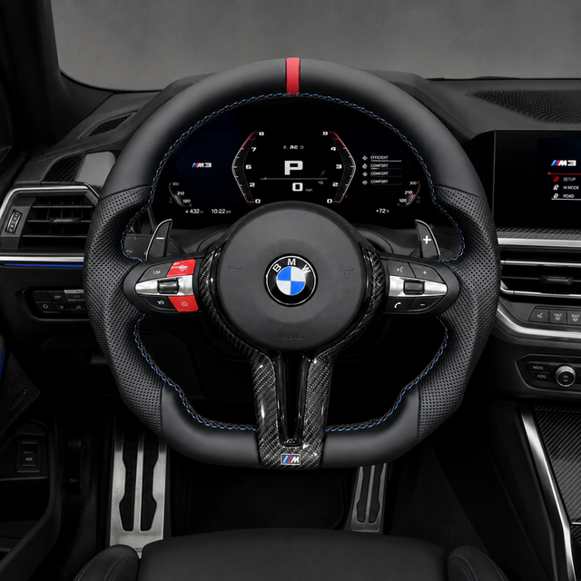 Custom BMW M3 steering wheel installed with red center stripe, blue stitching, perforated leather and carbon fiber trim