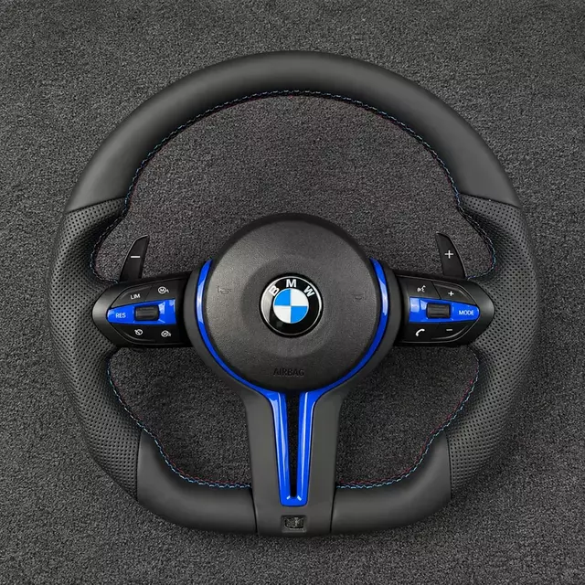 Custom BMW 7 Series leather steering wheel with blue trim, perforated grips, M-color stitching and paddle shifters