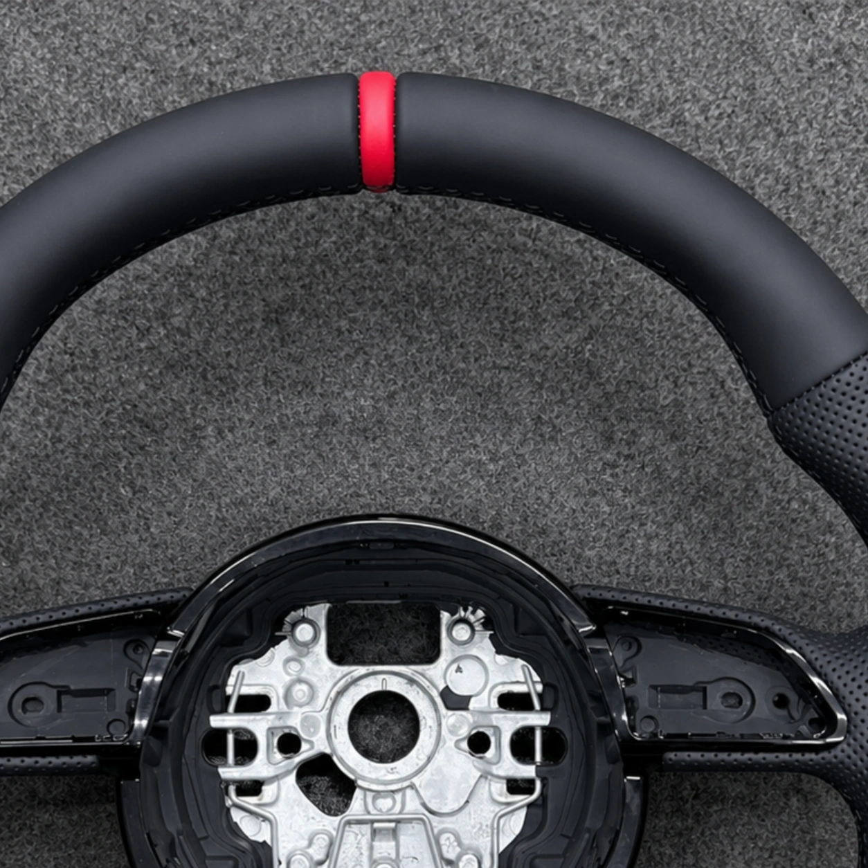Close Shot Of Red Top Racing Marker Stripe On JIONX Black Leather Audi S Line Wheel