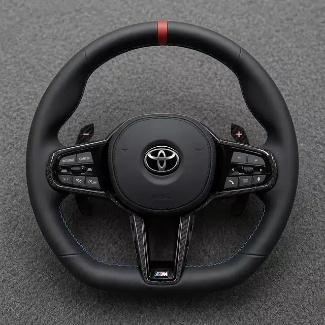 Toyota CS style Nappa leather custom steering wheel with red center stripe, carbon fiber trim and paddle shifters