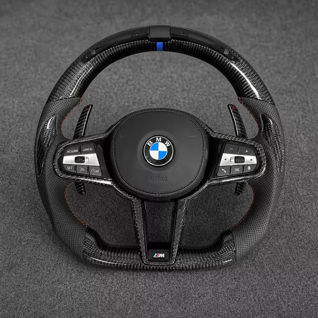 BMW M Performance carbon fiber LED steering wheel with perforated leather grips, blue center stripe and orange stitching