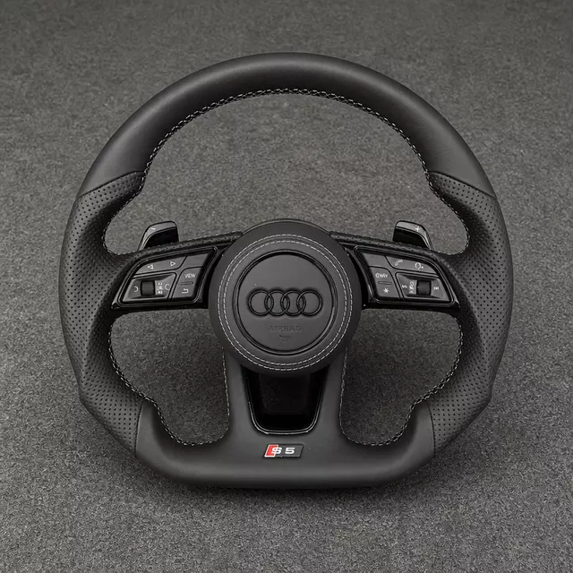 Custom Audi A8 black Nappa leather flat-bottom wheel with perforated grips, white stitching and shift paddles