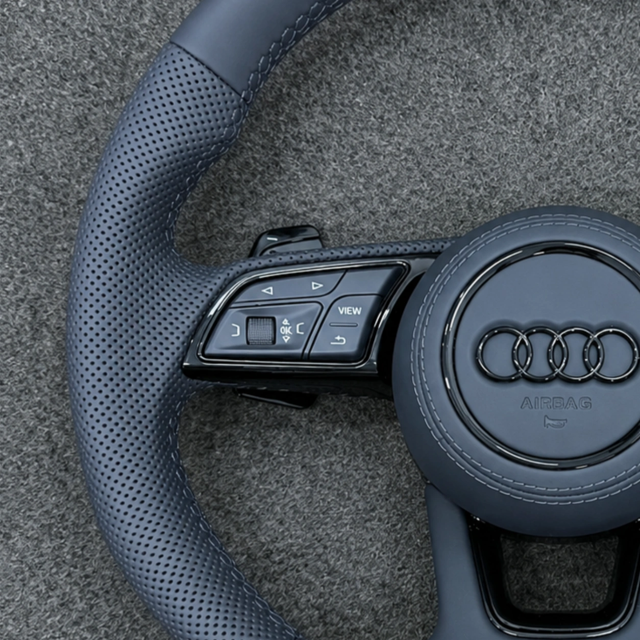 Semi Perforated Leather And Precise Stitching Detail On Audi S Line Steering Wheel JIONX