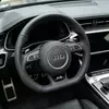 Installed effect of black perforated Nappa flat bottom steering wheel with purple stitch fit Audi A6 A7 A8 RS series JIONX