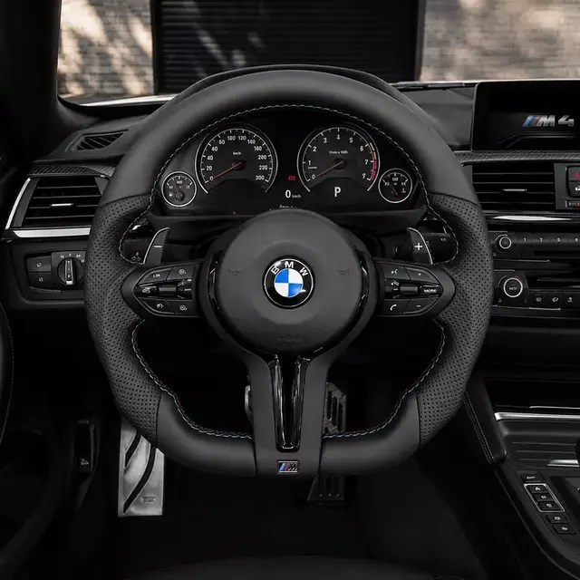 Black Nappa leather steering wheel for BMW 4 Series M4 F models with perforated grips, M-color stitching and paddle shifters