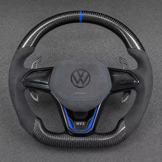 Golf MK8 GTI custom carbon fiber performance steering wheel with blue accents and sport grip