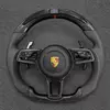 Custom carbon fiber steering wheel (with LED turn signals) for Porsche models such as the 911 Panamera Cayenne and Macan