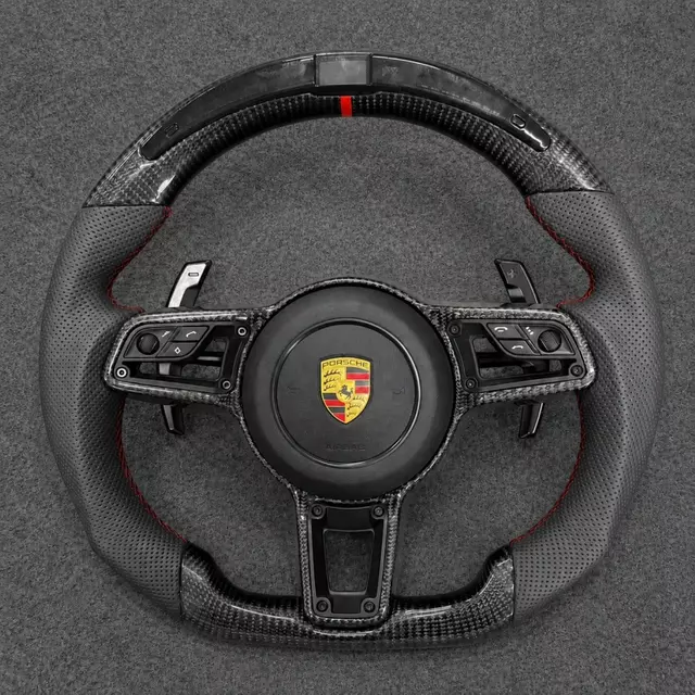 Custom carbon fiber steering wheel (with LED turn signals) for Porsche models such as the 911 Panamera Cayenne and Macan