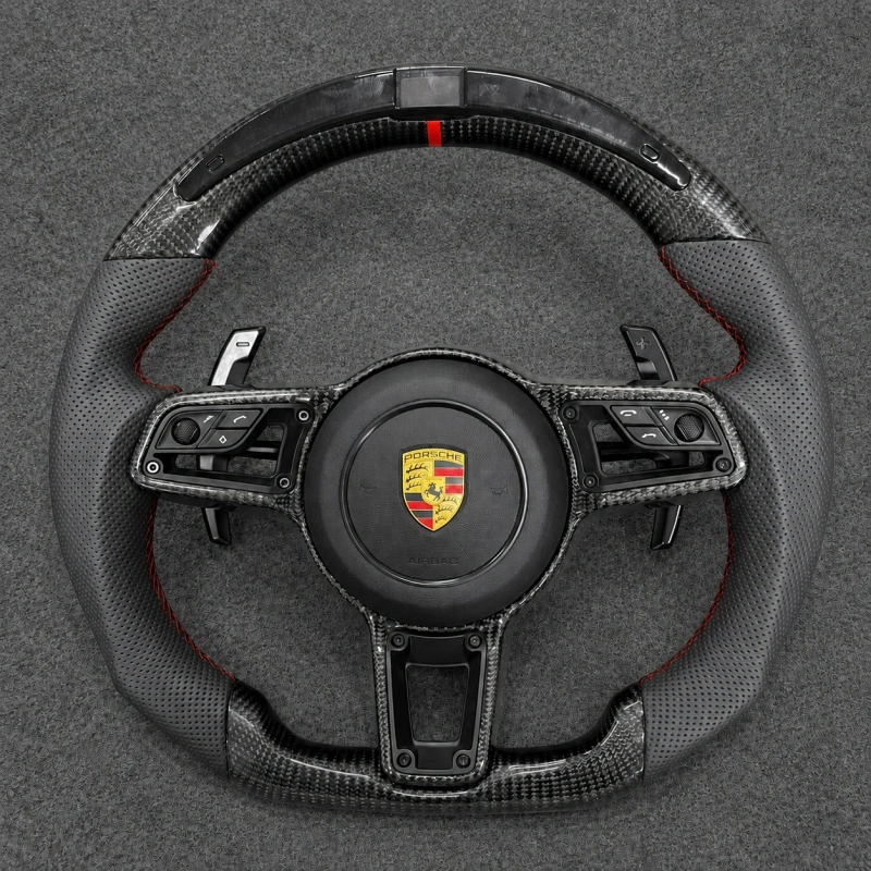 Custom carbon fiber steering wheel (with LED turn signals) for Porsche models such as the 911 Panamera Cayenne and Macan