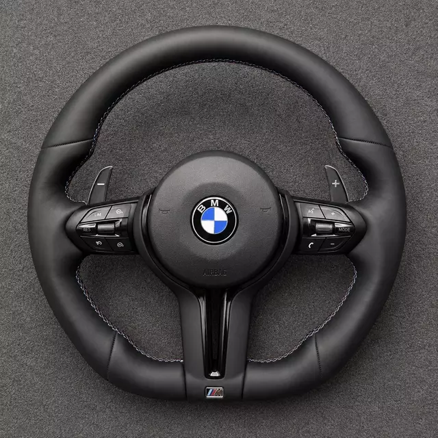 Custom BMW M5 and 5 Series Nappa leather steering wheel with M stitching, black lower spoke and paddle shifters