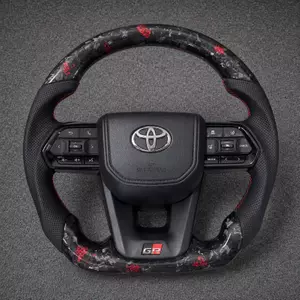 Toyota GR custom red fleck real forged carbon fiber steering wheel with perforated leather and red stitching