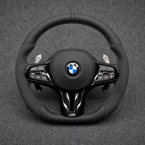 BMW M Performance Alcantara steering wheel with blue stitching, multifunction controls, paddle shifters and flat bottom