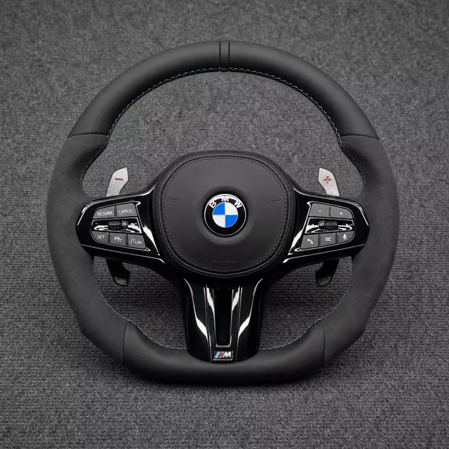 BMW M Performance Alcantara steering wheel with blue stitching, multifunction controls, paddle shifters and flat bottom