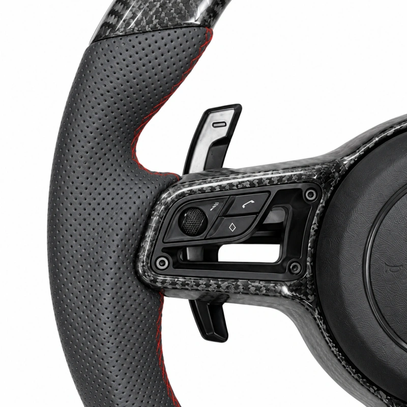 Custom carbon fiber steering wheel (with LED turn signals) for Porsche models such as the 911 Panamera Cayenne and Macan