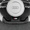 Close up flat bottom gloss carbon fiber trim with S logo two tone white leather steering wheel for Audi A Q S RS series