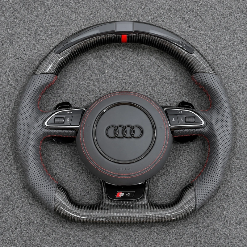 Studio shot Audi S4 B8 B8.5 D shape carbon steering wheel, full gray perforated leather, uniform red stitching and top center red marker stripe