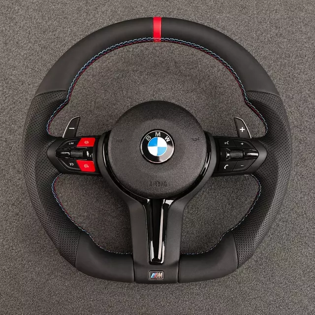 Custom BMW M Sport flat-bottom steering wheel with red center stripe, M-color stitching, red buttons and paddle shifters