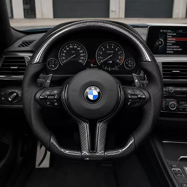 BMW X5 F15 carbon fiber steering wheel installed in vehicle