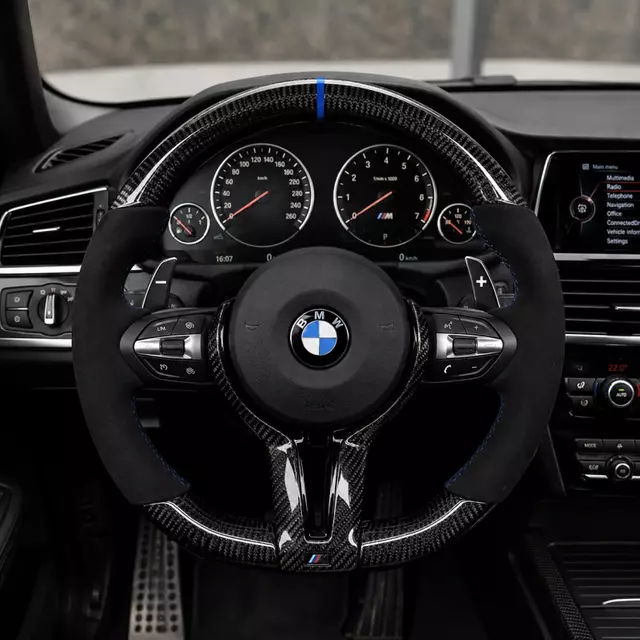 BMW X3 F25 custom carbon fiber steering wheel installed in vehicle