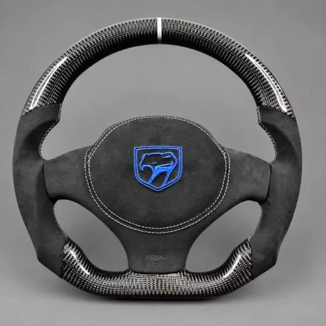 Dodge Viper custom carbon fiber steering wheel with Alcantara grips and blue center emblem