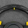 Clos up yellow racing marker and LED carbon fiber top trim for Audi RS custom flat bottom steering wheel