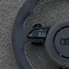 JIONX soft Alcantara suede with neat white stitching detail on Audi sport steering wheel