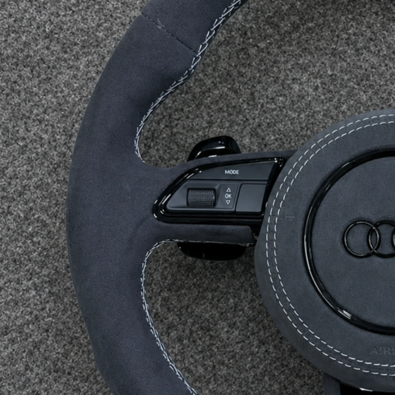 JIONX soft Alcantara suede with neat white stitching detail on Audi sport steering wheel
