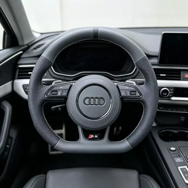 Grey nappa flat steering wheel installed on Audi cockpit silver stitch JION