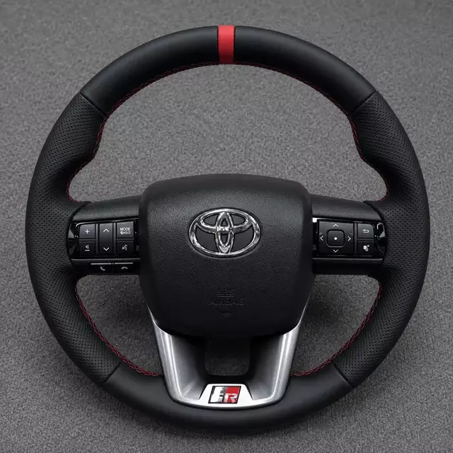 Toyota GR custom Nappa leather steering wheel with perforated grips, red center stripe and stitching