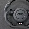 Breathable perforated gray leather grip, clean white contrast stitching for Audi carbon wheel