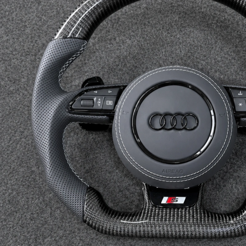 Breathable perforated gray leather grip, clean white contrast stitching for Audi carbon wheel