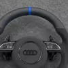 Blue stitching detail on Audi Alcantara sport steering wheel