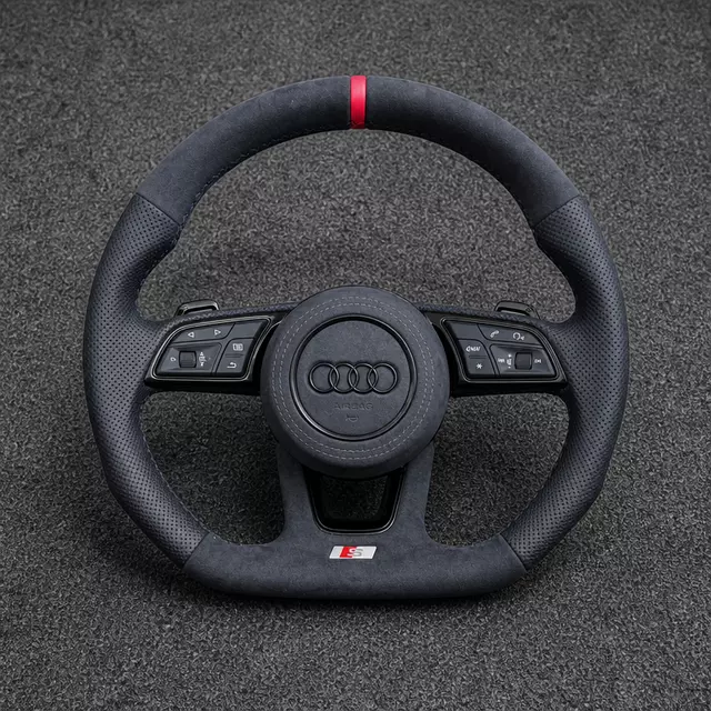 Custom Audi A3 8Y Alcantara flat-bottom wheel with perforated Nappa leather, red center stripe and shift paddles