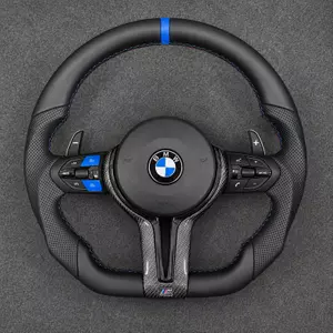 Custom BMW M5 leather steering wheel with blue accents, perforated grips, carbon fiber trim and paddle shifters