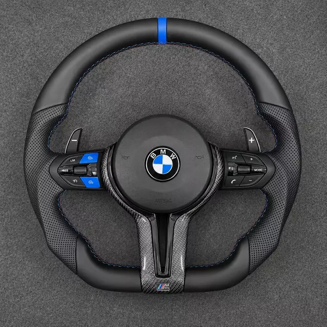 Custom BMW M5 leather steering wheel with blue accents, perforated grips, carbon fiber trim and paddle shifters
