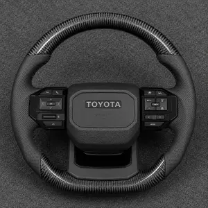 Toyota 4Runner custom gloss black flat bottom steering wheel with perforated leather grips