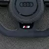 JIONX flat bottom racing performance shape closeup for Audi suede steering wheel