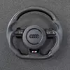 Audi flat bottom carbon fiber steering wheel, perforated gray leather, white stitching, S badge, multifunction buttons