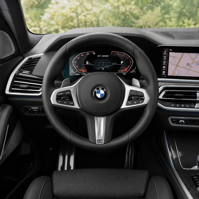 BMW X7 G07 custom leather steering wheel installed in vehicle