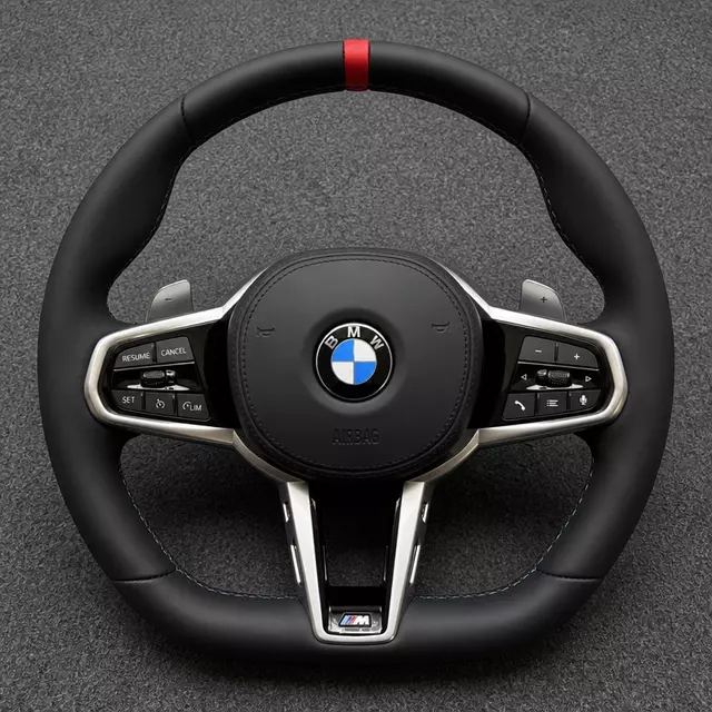 BMW M Performance black Nappa leather steering wheel with red center stripe, silver trim, controls and paddle shifters