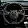 Installed cabin view of Audi RS carbon fiber steering wheel with dark brown 12 o'clock straight mark perforated Nappa leather JIONX