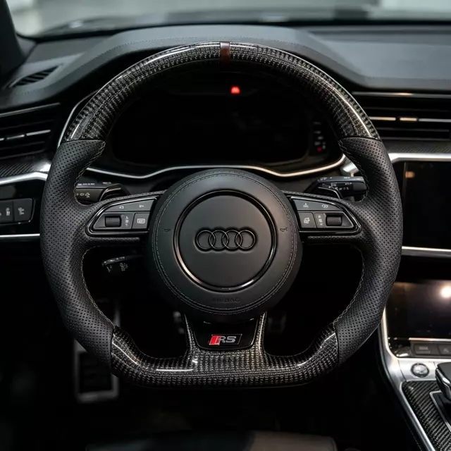 Installed cabin view of Audi RS carbon fiber steering wheel with dark brown 12 o'clock straight mark perforated Nappa leather JIONX