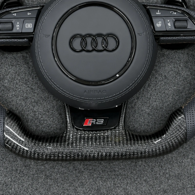 D-shape flat bottom layout with RS badge on Audi carbon fiber performance steering wheel