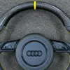 Close up of JIONX carbon wheel yellow top center marker stripe, glossy forged carbon fiber texture