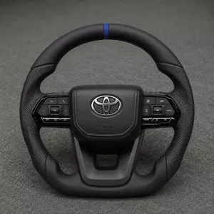 Toyota custom Nappa leather steering wheel with perforated grips, blue center stripe and flat bottom