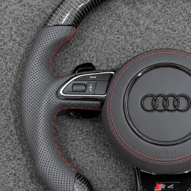Studio shot Audi S4 B8 B8.5 D shape carbon steering wheel, full gray perforated leather, uniform red stitching and top center red marker stripe