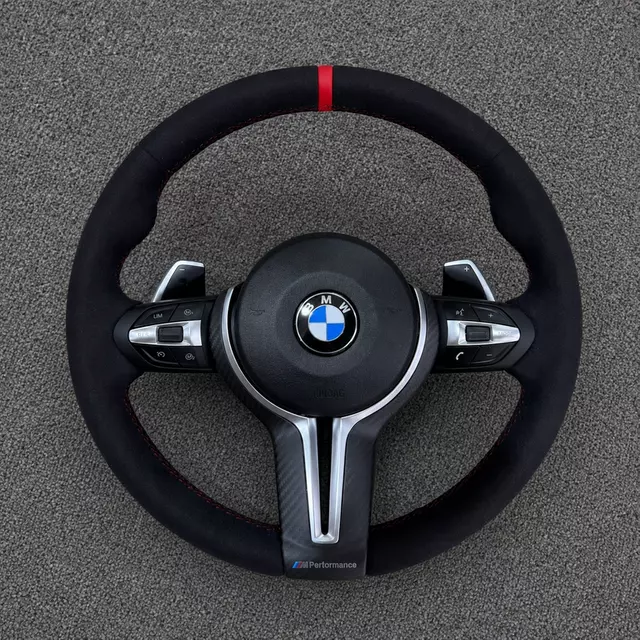 BMW X3 E83 custom leather steering wheel with perforated grip and sport center stripe