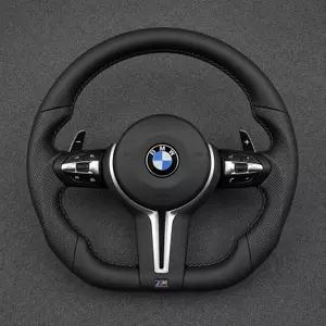 Custom BMW M Sport flat-bottom steering wheel with perforated leather grips, M-color stitching and silver trim