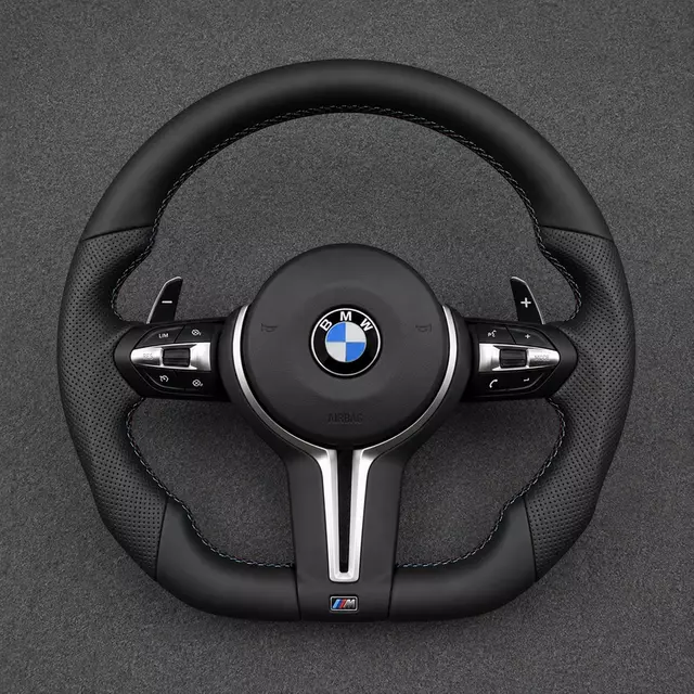 Custom BMW M Sport flat-bottom steering wheel with perforated leather grips, M-color stitching and silver trim