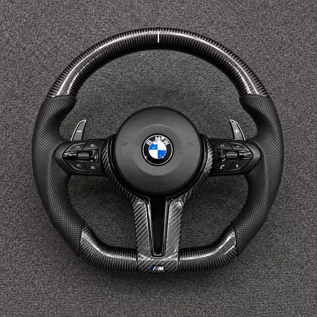 BMW X7 G07 custom carbon fiber steering wheel with premium leather grip and factory-style fit